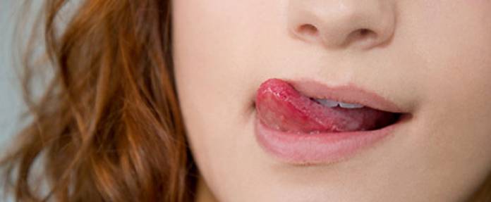 Wann kann ein Zungenbrennen ansteckend sein?